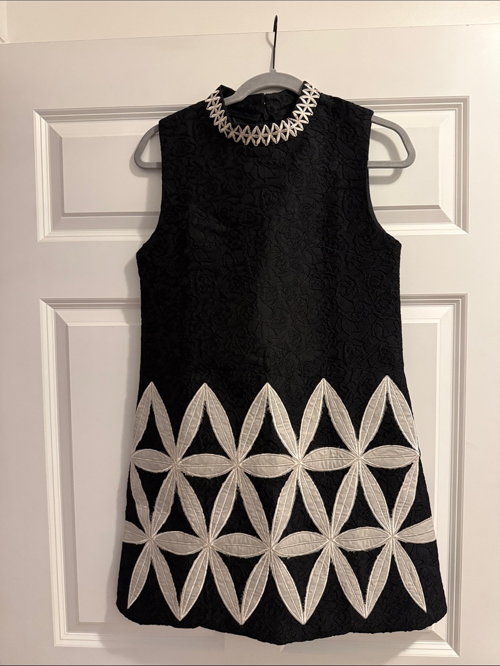 Black Sleeveless Embroidered Shift Dress with White Geometric Trim